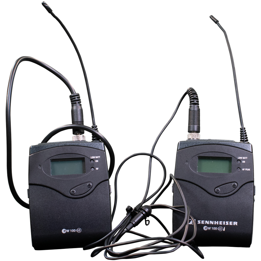 Image of two wireless microphone units.